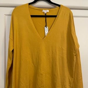 Cute never worn mustard/goldenrod v-neck sweater.